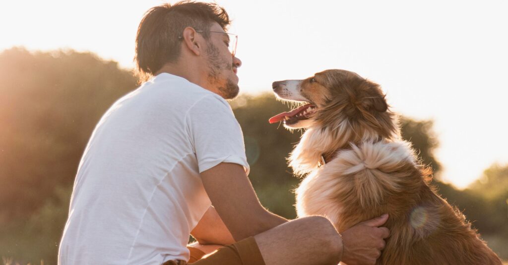 man with a dog source: freepic